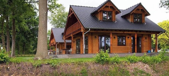 Lujosa villa de madera Tine en zona boscosa con vistas impresionantes al campo